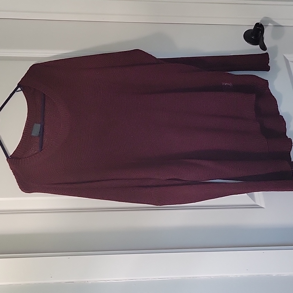 Burgandy sweater.